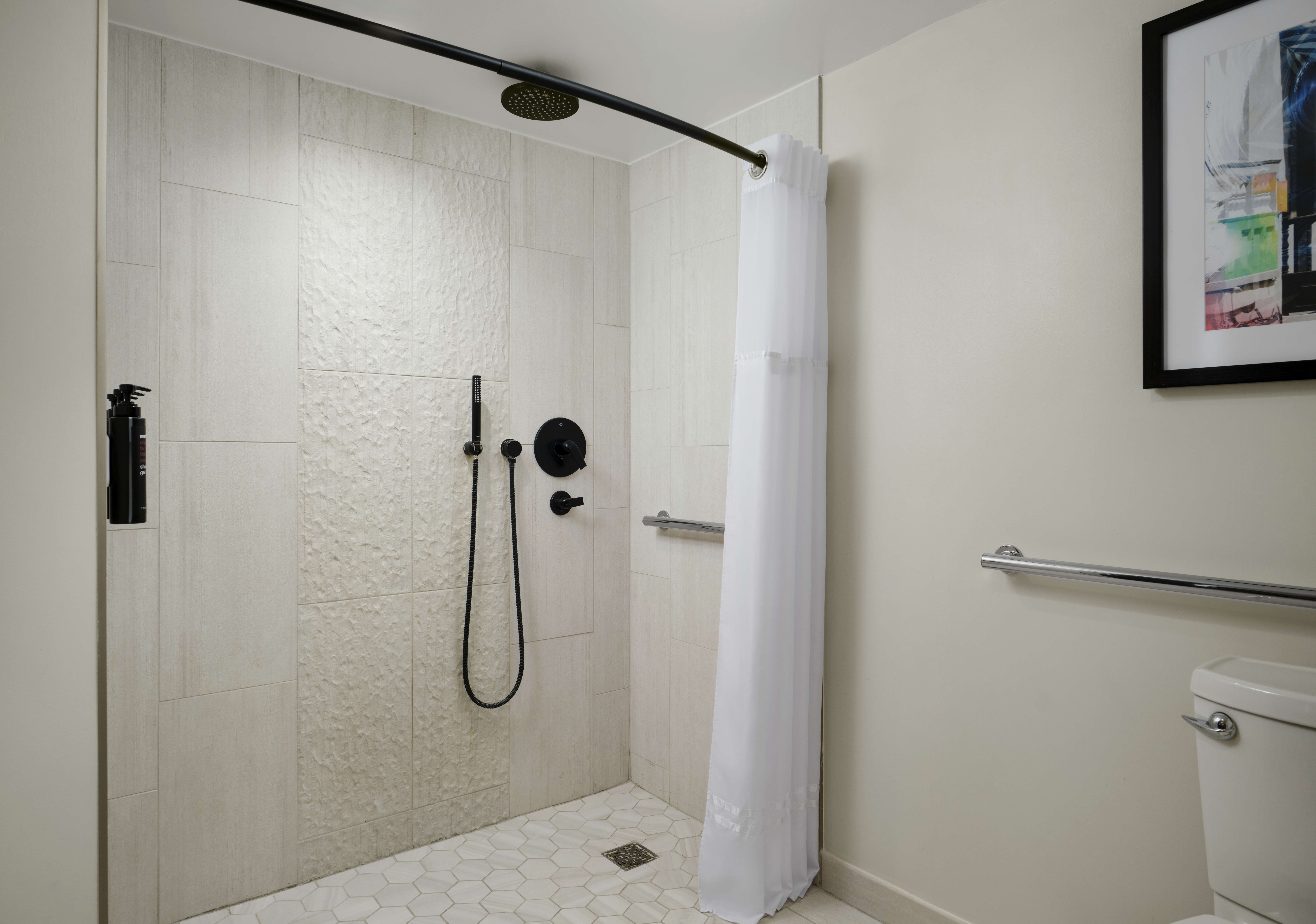 image-Club-Terrace-King-Pool-View-Mobility-Accessible-Roll-In-Shower-1